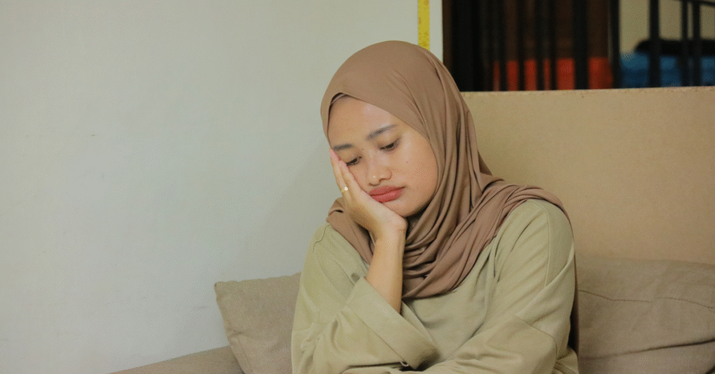 Concerned mother thinking about her child’s Quran learning and recitation support at home